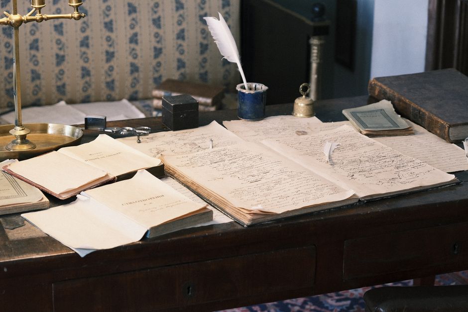Open books and notes on a desk